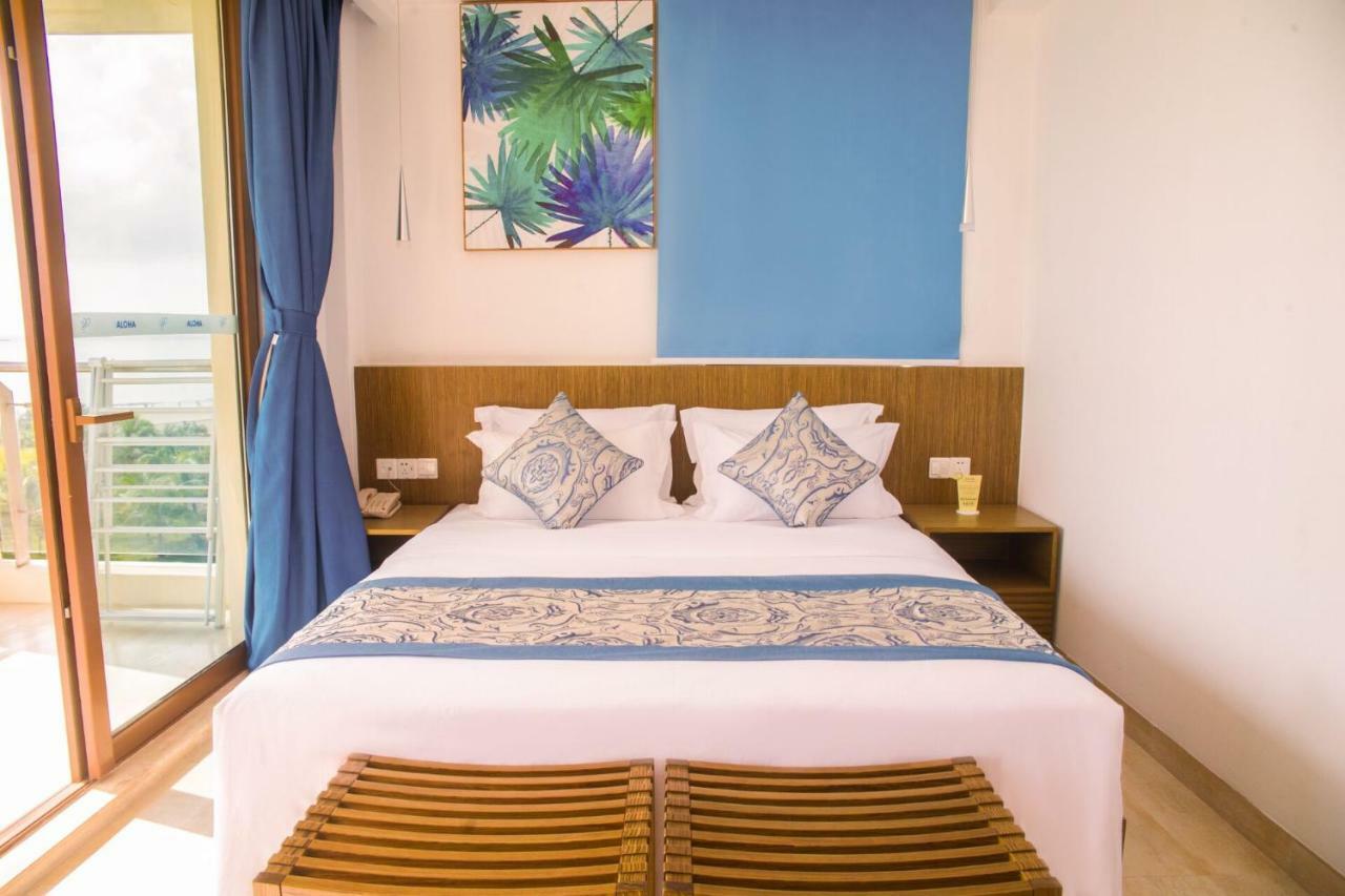 Aloha Oceanfront Suite Resort Линшуй Номер фото
